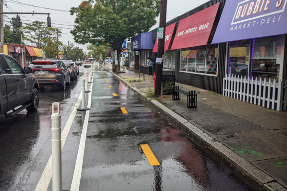 A bike lane on a busy street in Rhode Island.